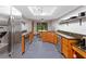 Kitchen with wood cabinets, stainless steel appliances, and granite countertops at 2114 Bluff Oak St, Apopka, FL 32712
