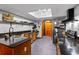 Well lit kitchen features granite countertops, stainless steel appliances, and modern fixtures and finishes at 2114 Bluff Oak St, Apopka, FL 32712