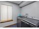 Laundry room featuring modern washer and dryer units at 2114 Bluff Oak St, Apopka, FL 32712