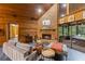 Living room featuring a fireplace, and a sunroom at 2114 Bluff Oak St, Apopka, FL 32712