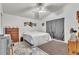 Bedroom with ceiling fan, carpet, and natural light from the window at 2122 Korat Ln, Maitland, FL 32751