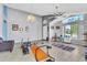 Inviting open living room with tiled floor, neutral decor, and abundant natural light at 2122 Korat Ln, Maitland, FL 32751