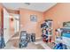 Storage room featuring tile floors and a window, filled with an assortment of bags and boxes at 2122 Korat Ln, Maitland, FL 32751