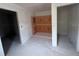 This bathroom has a tiled shower, drywall and concrete floors at 22117 Amberbush Court, Mount Dora, FL 32757