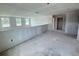 Open loft area with multiple windows and versatile space for various needs at 22117 Amberbush Court, Mount Dora, FL 32757