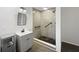 Bathroom with a tiled shower, modern sink, and updated fixtures at 224 Briar Cliff Dr, Longwood, FL 32779