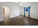 Bedroom featuring hardwood floors, one window, and access to the closet at 224 Briar Cliff Dr, Longwood, FL 32779