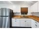 Updated kitchen featuring new stainless steel appliances, stylish sink and ample counter space at 224 Briar Cliff Dr, Longwood, FL 32779