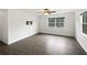 Clean and spacious living room with wood flooring, ample natural light and open space at 224 Briar Cliff Dr, Longwood, FL 32779