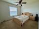 Bedroom with a bed and a nightstand at 2673 Dixie Ln, Kissimmee, FL 34744