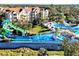 Community pools and waterpark along with residential buildings at 2781 Almaton Loop # 105, Kissimmee, FL 34747