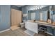 Bathroom featuring tile flooring, a shower with curtain, and a vanity with stool at 2781 Almaton Loop # 105, Kissimmee, FL 34747