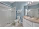 Bathroom featuring a shower, toilet, and vanity sink at 2781 Almaton Loop # 105, Kissimmee, FL 34747