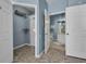 Hallway view of the walk-in closet and bathroom at 2781 Almaton Loop # 105, Kissimmee, FL 34747