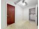 Functional laundry room with washer, dryer, storage, and a practical design for convenience at 2885 Autumn Green Dr, Orlando, FL 32822
