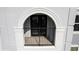 Cozy balcony area framed by decorative arch and black railings at 300 E South St # 6003, Orlando, FL 32801