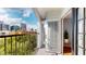 Balcony with views of the city, black metal railings, and an indoor/outdoor flow at 300 E South St # 6003, Orlando, FL 32801