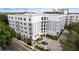 Elegant building exterior showcasing landscaped entrance and architectural details at 300 E South St # 6003, Orlando, FL 32801