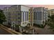 Beautiful building exterior at dusk featuring well-lit windows and landscaping at 300 E South St # 6003, Orlando, FL 32801