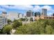 Stunning city view overlooking lush trees and urban buildings at 300 E South St # 6003, Orlando, FL 32801