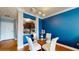 Cozy dining area adjacent to the kitchen features a glass-top table with seating for four at 300 E South St # 6003, Orlando, FL 32801