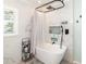 Well-lit bathroom featuring a soaking tub with sleek fixtures and elegant tile, creating a clean and relaxing atmosphere at 3104 Harrison Ave # E-30, Orlando, FL 32804