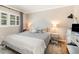 Inviting bedroom with neutral decor, ample natural light, and comfortable furnishings creating a relaxing and serene atmosphere at 3104 Harrison Ave # E-30, Orlando, FL 32804