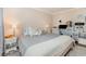 Bedroom featuring neutral tones, natural light, cozy textiles, and functional workspace, promoting rest and productivity at 3104 Harrison Ave # E-30, Orlando, FL 32804