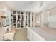 Spacious closet with custom shelving offering ample storage for clothing, shoes, and accessories, enhancing organization at 3104 Harrison Ave # E-30, Orlando, FL 32804