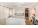 Bright main bedroom with a ceiling fan, an ensuite closet, hardwood floors and plenty of storage cabinets at 3104 Harrison Ave # E-30, Orlando, FL 32804