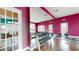 Community fitness center with free weights, cardio machines and hardwood flooring at 3238 Wish Ave, Kissimmee, FL 34747