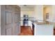 Kitchen featuring stainless steel appliances, granite countertops and hard wood floors at 3238 Wish Ave, Kissimmee, FL 34747