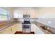 Well-equipped kitchen featuring stainless steel appliances, granite countertops, and ample cabinet space at 3238 Wish Ave, Kissimmee, FL 34747