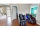 Relaxing lounge area with massage chairs and access to the playroom, perfect for winding down at 3238 Wish Ave, Kissimmee, FL 34747