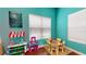 The playroom is equipped with toys, a kid-sized table, and chairs making it a fun place for children at 3238 Wish Ave, Kissimmee, FL 34747