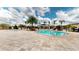 Lagoon style pool and lounge chairs in a well-maintained community space at 3238 Wish Ave, Kissimmee, FL 34747