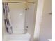 Clean white shower featuring a tub and shower head at 3238 Wish Ave, Kissimmee, FL 34747