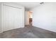 Bedroom with carpet flooring and a closet providing ample storage space at 408 Lily Ln, Davenport, FL 33837