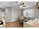 Inviting living room featuring hardwood floors and comfortable seating arrangement at 413 Macchi Ave, Oakland, FL 34787