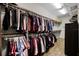 Spacious walk-in closet with hardwood floors and ample storage space at 413 Macchi Ave, Oakland, FL 34787