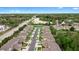 Newer townhome community features sidewalks, nearby green spaces, and convenient parking at 456 Harbor Winds Ct, Winter Springs, FL 32708