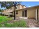 Spacious backyard with grass and a patio area, perfect for outdoor relaxation at 456 Harbor Winds Ct, Winter Springs, FL 32708
