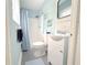 Bathroom with white vanity, new toilet and new shower at 511 S Alder Ave, Orlando, FL 32807