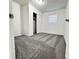 Bedroom features closet and neutral carpet at 511 S Alder Ave, Orlando, FL 32807