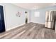 Modern kitchen with stainless steel appliances, updated backsplash, and stylish flooring at 511 S Alder Ave, Orlando, FL 32807