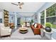 Bright living room with large windows, stylish furniture, and modern decor, creating a welcoming space at 511 S Alder Ave, Orlando, FL 32807
