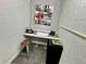 Efficient office nook featuring built-in desk, modern decor, and a well-lit workspace at 511 S Alder Ave, Orlando, FL 32807