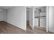Bright laundry room with washer, dryer, and storage cabinets for added convenience at 5156 Conroy Rd # 1124, Orlando, FL 32811