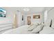 Bright bedroom with a flatscreen television, clean, white interior design, and comfortable sleeping at 5248 Royal Point Ave, Kissimmee, FL 34746