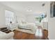 Bright bedroom with hardwood floors with modern furnishings and decor at 5248 Royal Point Ave, Kissimmee, FL 34746